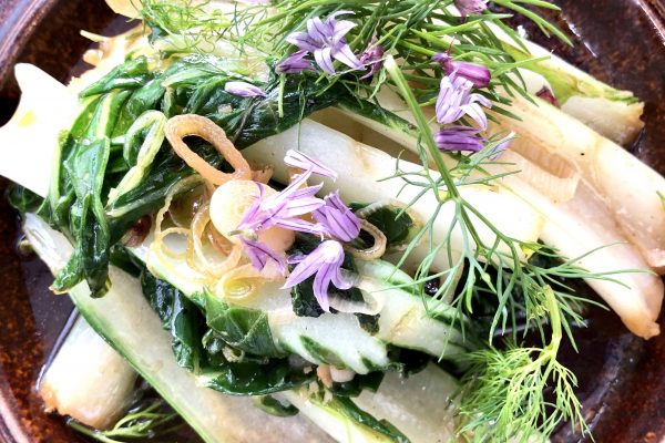 Braised bok choy, dill, chive blossoms, at Manfreds